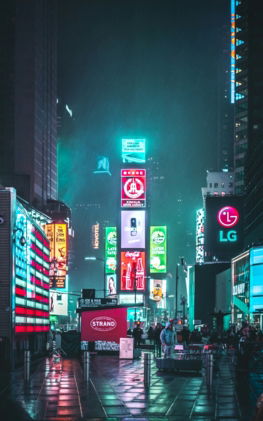 group of people walking near high-rise buildings